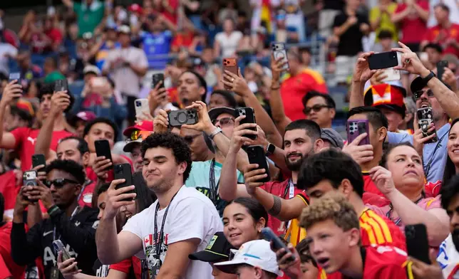Fans wait for the beginning of the World Cup Group G soccer match between Belgium and Egypt in Seattle, Monday, June 15, 2026. (AP Photo/Lindsey Wasson)