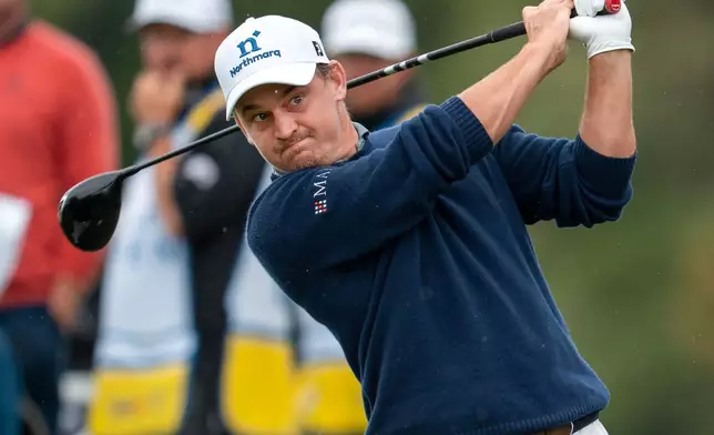 Bud Cauley, of the UnitedStates, watches his tee shot on the second hole during the final round of the Canadian Open golf tournament in Caledon, Ontario, Sunday, June 14, 2026. (Frank Gunn/The Canadian Press via AP)