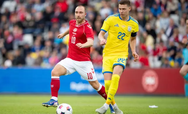 Denmark's Christian Eriksen, left, in action with Ukraine's Mykola Matviyenko during an international football game, in Odense, Denmark, Sunday, June 7, 2026. (Bo Amstrup/Ritzau Scanpix via AP)