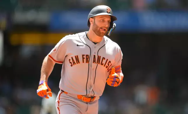 San Francisco Giants' Casey Schmitt runs the bases after hitting a home run during the first inning of a baseball game against the Milwaukee Brewers, Thursday, June 4, 2026, in Milwaukee. (AP Photo/Kayla Wolf)