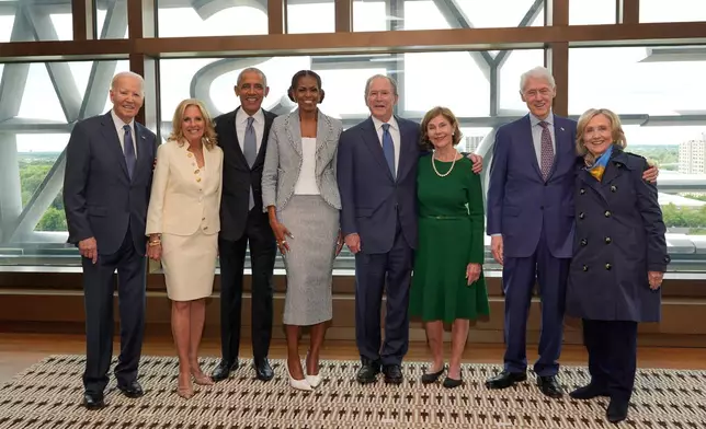 Former President Joe Biden and former first lady Jill Biden, from left, former President Barack Obama and former first lady Michelle Obama, former President George W. Bush and former first lady Laura Bush, and former President Bill Clinton and former Secretary of State Hillary Clinton, pose for a photo ahead of the dedication ceremony at the Obama Presidential Center, Thursday, June 18, 2026, in Chicago. (AP Photo/Pablo Martinez Monsivais, Pool)