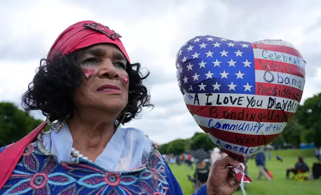 Shelia Clay arriving for the watch party at the Midway Plaisance Park for the dedication ceremony for the Obama Presidential Center, Thursday, June 18, 2026, in Chicago. (AP Photo/Nam Y. Huh)