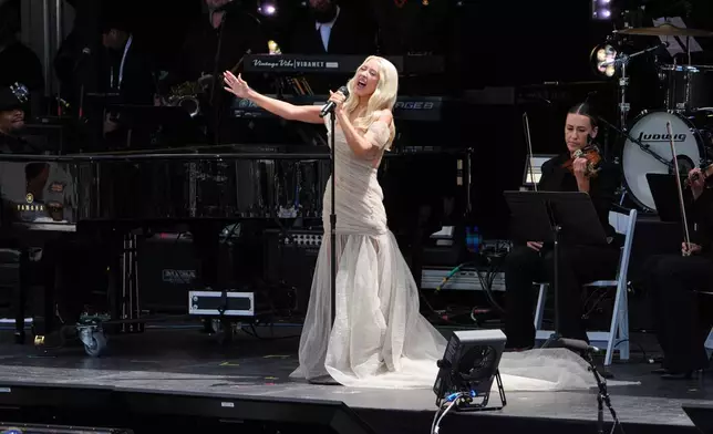 Singer Christina Aguilera performs during the dedication ceremony for the Obama Presidential Center, Thursday, June 18, 2026, in Chicago. (AP Photo/Jeff Roberson)