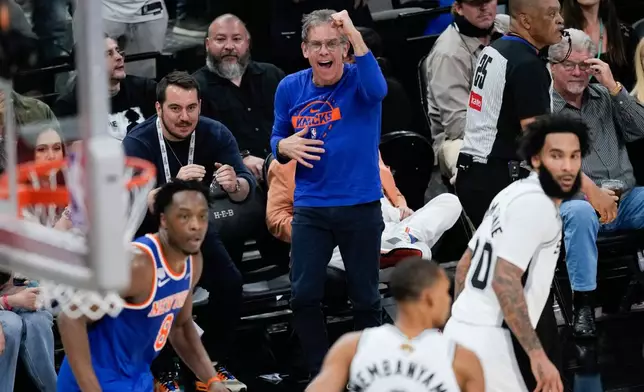 Actor Ben Stiller cheers during the first half of Game 2 of the NBA Finals basketball series between the New York Knicks and the San Antonio Spurs, Friday, June 5, 2026, in San Antonio. (AP Photo/David J. Phillip)