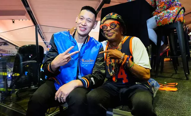 Former NBA player Jeremy Lin, left, and filmmaker Spike Lee pose for a photo prior to Game 3 of the NBA Finals basketball series between the San Antonio Spurs and the New York Knicks, Monday, June 8, 2026, in New York. (AP Photo/Yuki Iwamura)