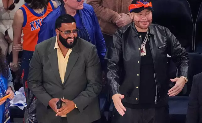 DJ Khaled, left, and Fat Joe arrive prior to Game 3 of the NBA Finals basketball series between the San Antonio Spurs and the New York Knicks, Monday, June 8, 2026, in New York. (AP Photo/Yuki Iwamura)
