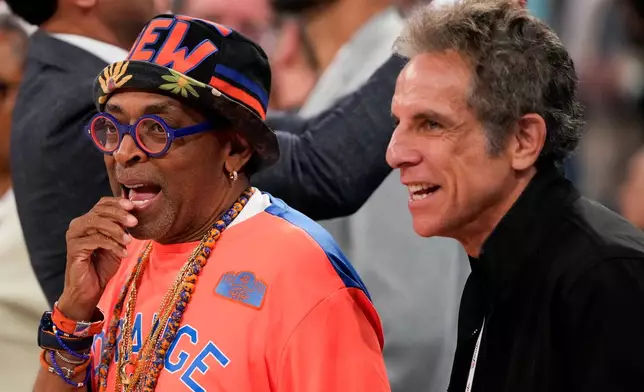 Filmmaker Spike Lee, left, and actor Ben Stiller watch warm ups prior to Game 4 of the NBA Finals basketball series between the San Antonio Spurs and the New York Knicks, Wednesday, June 10, 2026, in New York. (AP Photo/Ross D. Franklin)