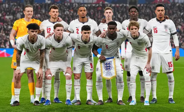 FILE - England players pose for a team photo before the start of the International friendly soccer match between England and Japan in London, Tuesday, March 31, 2026 . (AP Photo/Kirsty Wigglesworth, File)