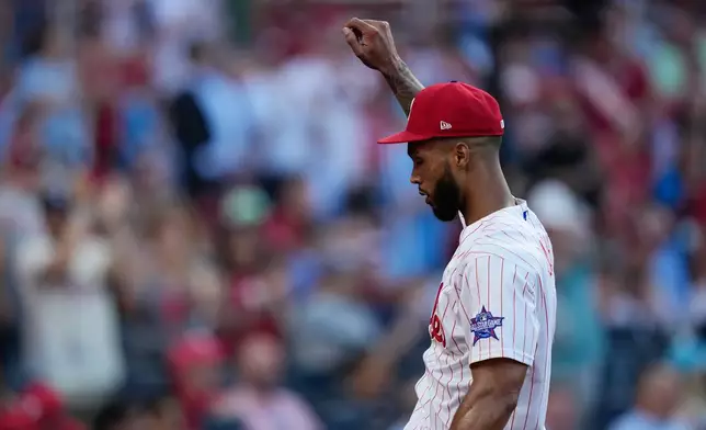 Philadelphia Phillies' Cristopher Sánchez gestures as he walks to the bench after pitching during the during the third inning of a baseball game against the San Diego Padres on Wednesday, June 3, 2026, in Philadelphia. (AP Photo/Matt Slocum)