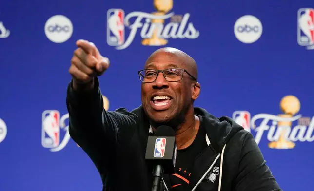 New York Knicks head coach Mike Brown speaks to the media prior to Game 3 of the NBA Finals basketball series against the San Antonio Spurs, Sunday, June 7, 2026, in New York. (AP Photo/Ross D. Franklin)