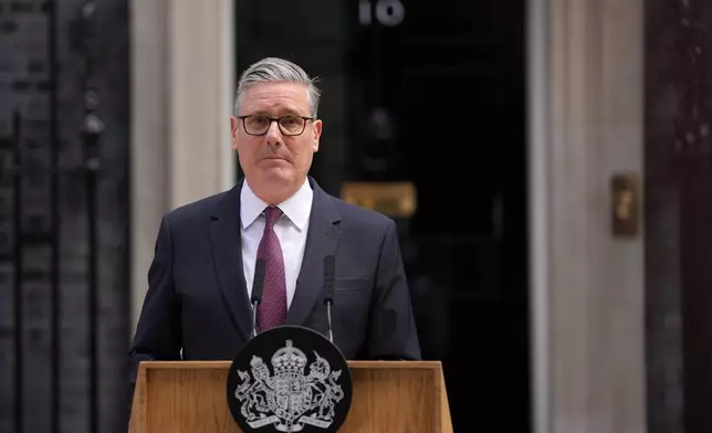 Britain's Prime Minister Keir Starmer announces his resignation to the media outside 10 Downing Street in London, Monday, June 22, 2026(AP Photo/Kin Cheung)