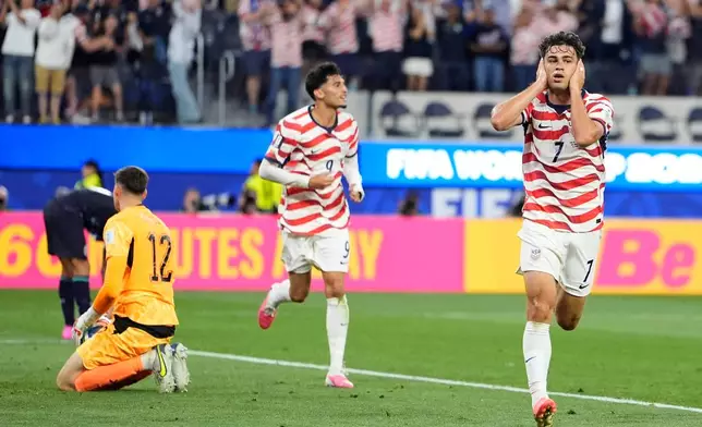 United States' Giovanni Reyna, right, reacts after scoring his team's fourth goal during the World Cup Group D soccer match between the United States and Paraguay in Inglewood, Calif., near Los Angeles, Friday, June 12, 2026. (AP Photo/Mark J. Terrill)