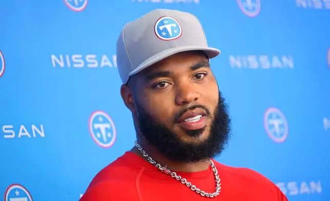 Tennessee Titans defensive tackle Jeffery Simmons speaks to the media after NFL football practice, Wednesday, June 17, 2026, in Nashville, Tenn. (AP Photo/John Amis)