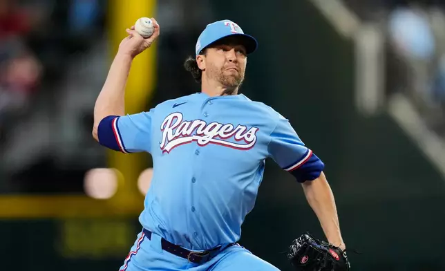 Texas Rangers pitcher Jacob Degrom throws to the Cleveland Guardians in the first inning of a baseball game in Arlington, Texas, Sunday, June 7, 2026. (AP Photo/Tony Gutierrez)
