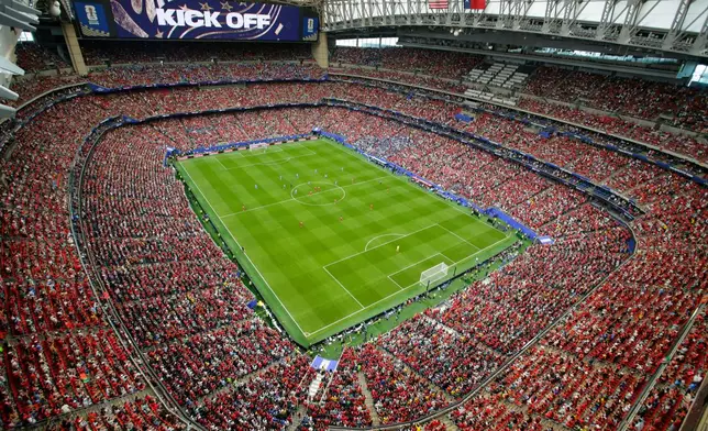 Players stand on the field at Houston Stadium before the World Cup Group K soccer match between Portugal and Congo in Houston, Wednesday, June 17, 2026. (AP Photo/Michael Wyke)
