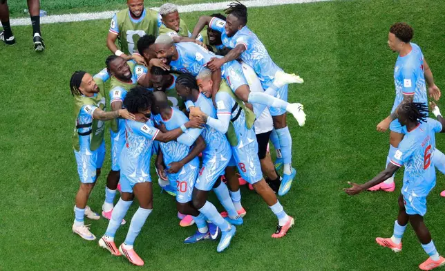 Congo players celebrate after a goal during the World Cup Group K soccer match between Portugal and Congo in Houston, Wednesday, June 17, 2026. (AP Photo/Michael Wyke)