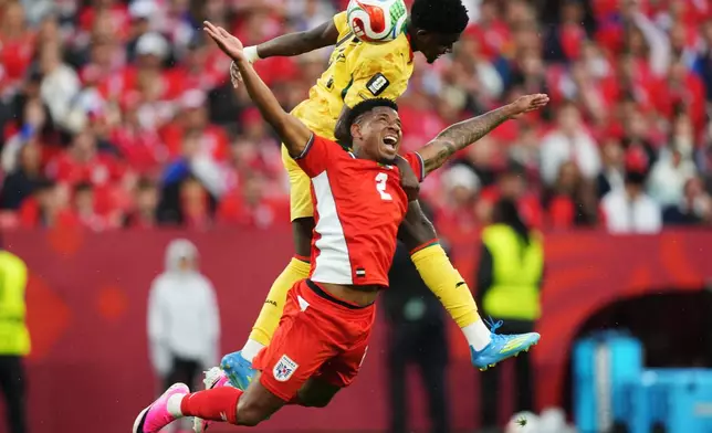 Ghana's Ernest Nuamah, top, and Panama's Cesar Blackman (2) vie for the ball during the World Cup Group L soccer match between Ghana and Panama in Toronto, Wednesday, June 17, 2026. (Nathan Denette/The Canadian Press via AP)