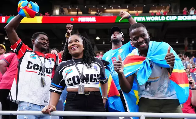 Congo supporters cheer for their team before the World Cup Group K soccer match between Portugal and Congo in Houston, Wednesday, June 17, 2026. (AP Photo/Karen Warren)
