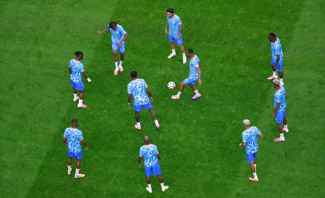 Members of team Congo warm up during the World Cup Group K soccer match between Portugal and Congo in Houston, Wednesday, June 17, 2026. (AP Photo/Michael Wyke)