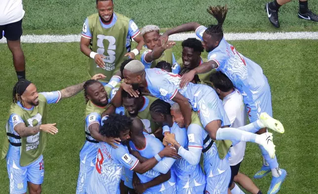 Congo players celebrate after a goal during the World Cup Group K soccer match between Portugal and Congo in Houston, Wednesday, June 17, 2026. (AP Photo/Michael Wyke)