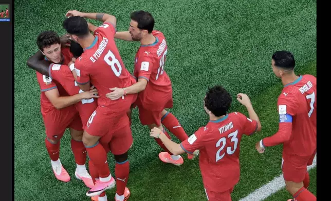 Portugal players celebrate after Joao Neves, left, scored during the World Cup Group K soccer match between Portugal and Congo in Houston, Wednesday, June 17, 2026. (AP Photo/Michael Wyke)