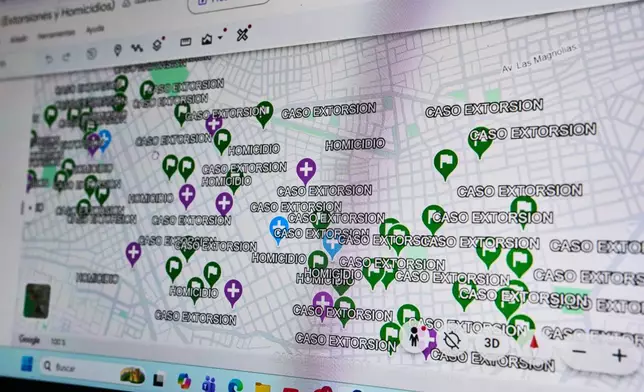 A map showing cases of extortion and murder in the La Esperanza district is displayed on the computer of an investigative police officer in Trujillo, Peru, Monday, May 18, 2026. (AP Photo/Rodrigo Abd)