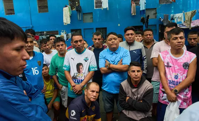 Inmates stand in a courtyard at El Milagro Prison in Trujillo, Peru, Wednesday, May 20, 2026. (AP Photo/Rodrigo Abd