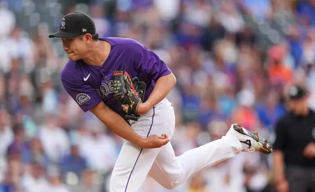 Colorado Rockies starting pitcher Tomoyuki Sugano works against the Chicago Cubs in the first inning of a baseball game Tuesday, June 9, 2026, in Denver. (AP Photo/David Zalubowski)