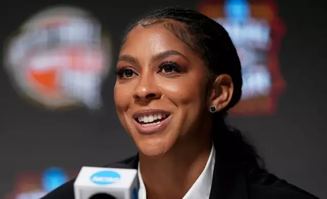 FILE - Naismith Hall of Fame Class of 2026 inductee Candace Parker speaks during a news conference at the Final Four of the NCAA college basketball tournament, April 4, 2026, in Indianapolis. (AP Photo/Michael Conroy, File)