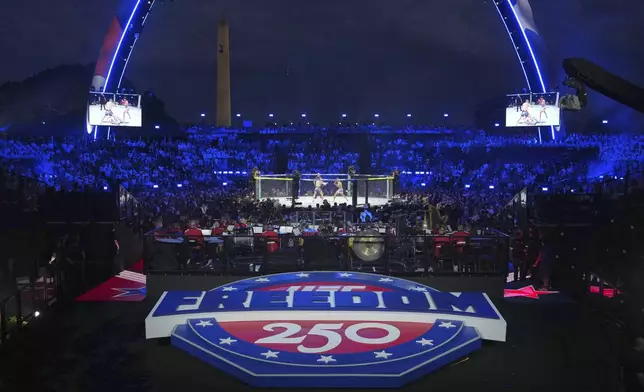Featherweight fighters Diego Lopez and Steve Garcia in the ring during the first fight at UFC Freedom 250 on the South Lawn of the White House, Sunday, June 14, 2026, in Washington. (AP Photo/Julia Demaree Nikhinson)