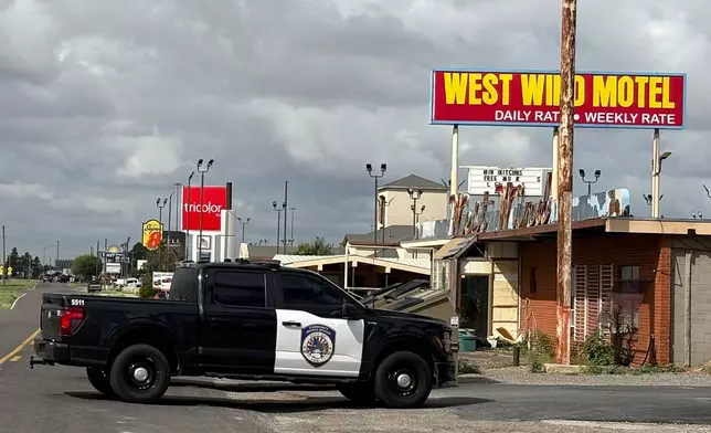 Law enforcement responds to an active shooting scene Friday, June 12, 2026, in Midland, Texas. (B. Kay Richter/Reporter-Telegram via AP) CORRECTION: Corrects byline to B. Kay Richter instead of Luke Dias.