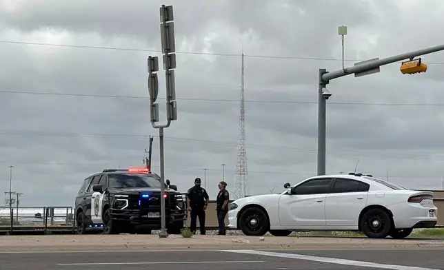 Law enforcement responds to an active shooting scene Friday, June 12, 2026, in Midland, Texas. (B. Kay Richter/Reporter-Telegram via AP)