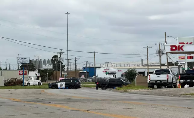 Law enforcement responds to an active shooting scene Friday, June 12, 2026, in Midland, Texas. (Luke Dias/Reporter-Telegram via AP)