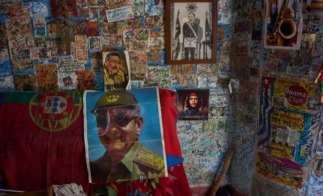 Images of Raul Castro, Che Guevara and Jose Marti decorate a wall in a souvenir shop in Havana, Tuesday, June 2, 2026. (AP Photo/Ramon Espinosa)
