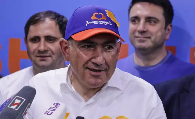 Armenian Prime Minister Nikol Pashinyan speaks at his Armenia Ruling Civil Contract party headquarters after parliamentary elections in Yerevan, Armenia, Monday, June 8, 2026. (AP Photo/Anthony Pizzoferrato)
