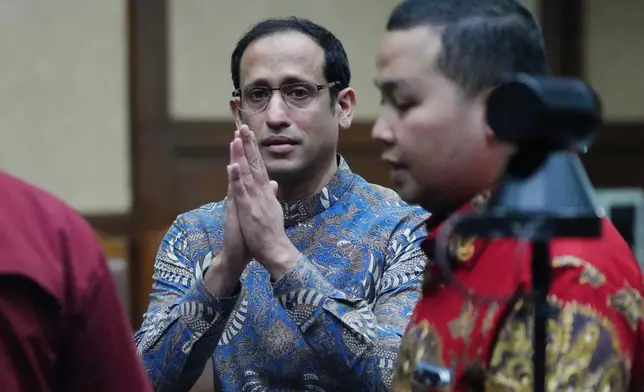 The co-founder of ride-hailing and payment giant Gojek and fomer Indonesian Education Minister Nadiem Anwar Makarim gestures after being sentenced in a Google Chromebook laptop procurement corruption case, at the Corruption Court in Jakarta, Indonesia, Tuesday, June 30, 2026. (AP Photo/Tatan Syuflana)