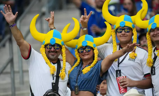 Fans react ahead of the World Cup Group F soccer match between Sweden and Tunisia in Guadalupe, near Monterrey, Mexico, Sunday, June 14, 2026. (AP Photo/Matias Delacroix)