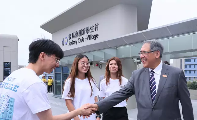 Lester Huang, Deputy Chairman of The Hong Kong Jockey Club (right) and The Hong Kong Jockey Club Scholarships awardees at Jockey Club i-Village.