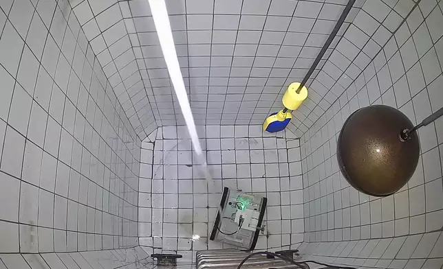 The robot can operate in both water-filled and drained environments and is equipped with an AI-assisted cleaning verification function to analyse contaminated areas.