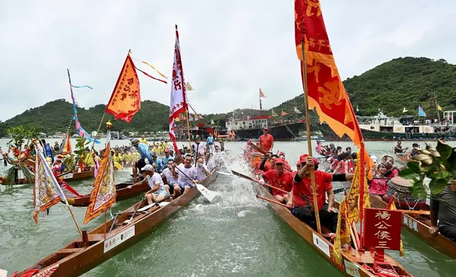 Three traditional dragon boats supported by the Club made their debut.