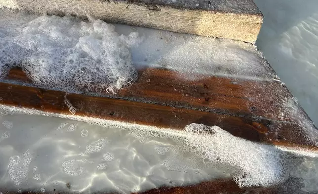 Snow-white salt settling on the ground, Photo by Bastille Post