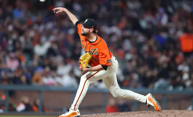 San Francisco Giants pitcher JT Brubaker throws to a Chicago Cubs batter during the sixth inning of a baseball game Friday, June 12, 2026, in San Francisco, Calif. (AP Photo/Scott Marshall)