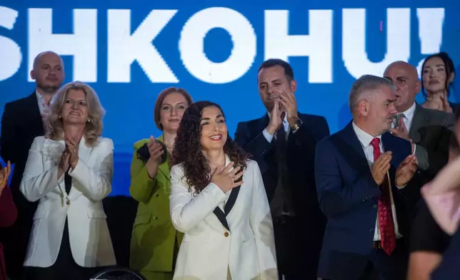 Vjosa Osmani, Kosovo former president, greets supporters at the closing political rally of the Democratic League of Kosovo (LDK), in capital Pristina on Friday, June 5, 2026. (AP Photo/Visar Kryeziu)
