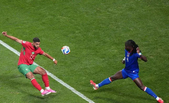 Morocco's Ismael Saibari (11) kicks the ball past Haiti's Ricardo Ade (4) during the World Cup Group C soccer match between Morocco and Haiti in Atlanta, Wednesday, June 24, 2026. (AP Photo/Jacob Kupferman)