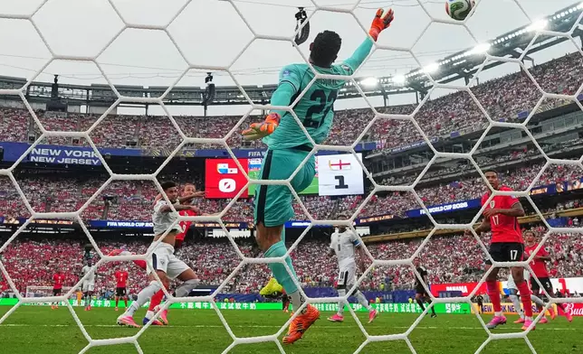 England's Harry Kane (9) scores their second goal during the World Cup Group L soccer match between Panama and England in East Rutherford, N.J., near New York, Saturday, June 27, 2026. (AP Photo/Frank Franklin II)