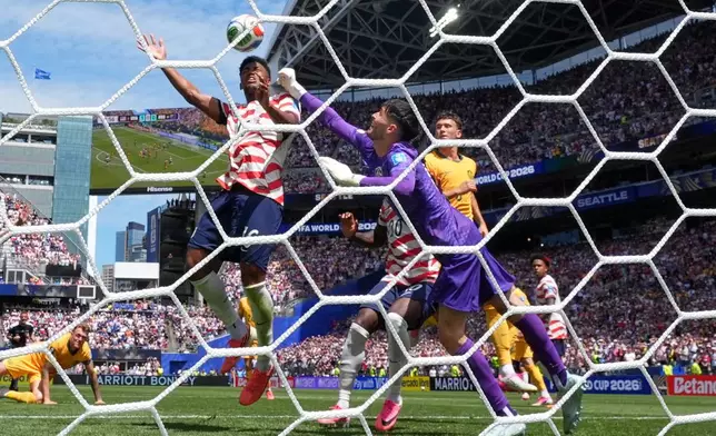 United States' Alex Freeman (16) scores their second goal during the World Cup Group D soccer match between the United States and Australia in Seattle, Friday, June 19, 2026. (AP Photo/Lindsey Wasson)