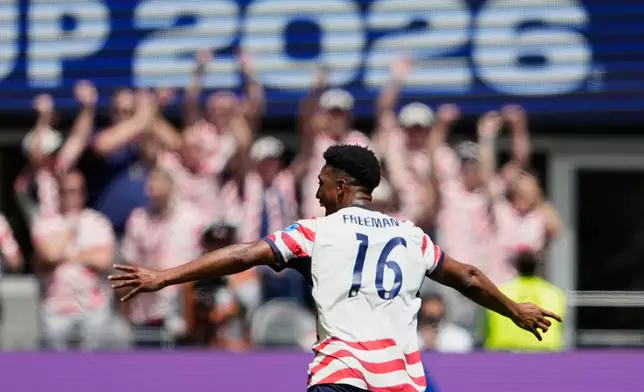 United States' Alex Freeman celebrates after scoring his side's second goal during the World Cup Group D soccer match between the United States and Australia in Seattle, Friday, June 19, 2026. (AP Photo/Lindsey Wasson)