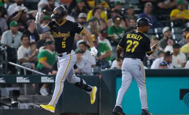 Pittsburgh Pirates' Brandon Lowe (5) rounds the bases after hitting a solo home run during the ninth inning of a baseball game against the Athletics, Tuesday, June 16, 2026, in West Sacramento, Calif. (AP Photo/Scott Marshall)