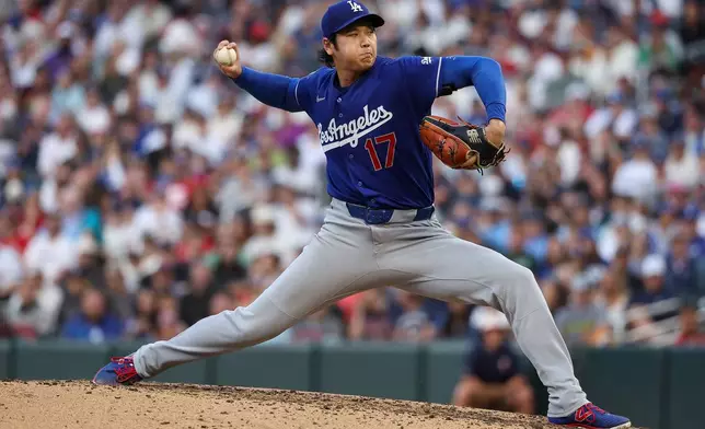 Los Angeles Dodgers starting pitcher Shohei Ohtani delivers against the Minnesota Twins during the sixth inning of a baseball game, Wednesday, June 24, 2026, in Minneapolis. (AP Photo/Matt Krohn)