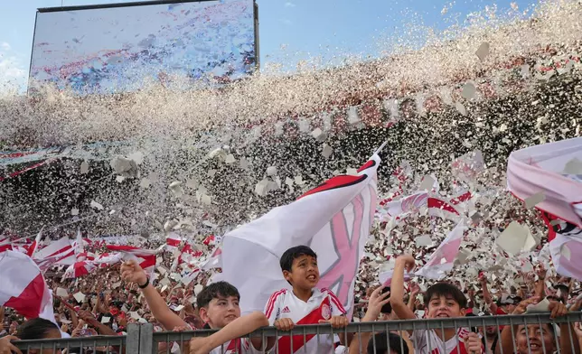 River Plate fans cheer during an Argentine league match against Boca Juniors in Buenos Aires, Argentina, Sunday, April 19, 2026. (AP Photo/Rodrigo Abd)